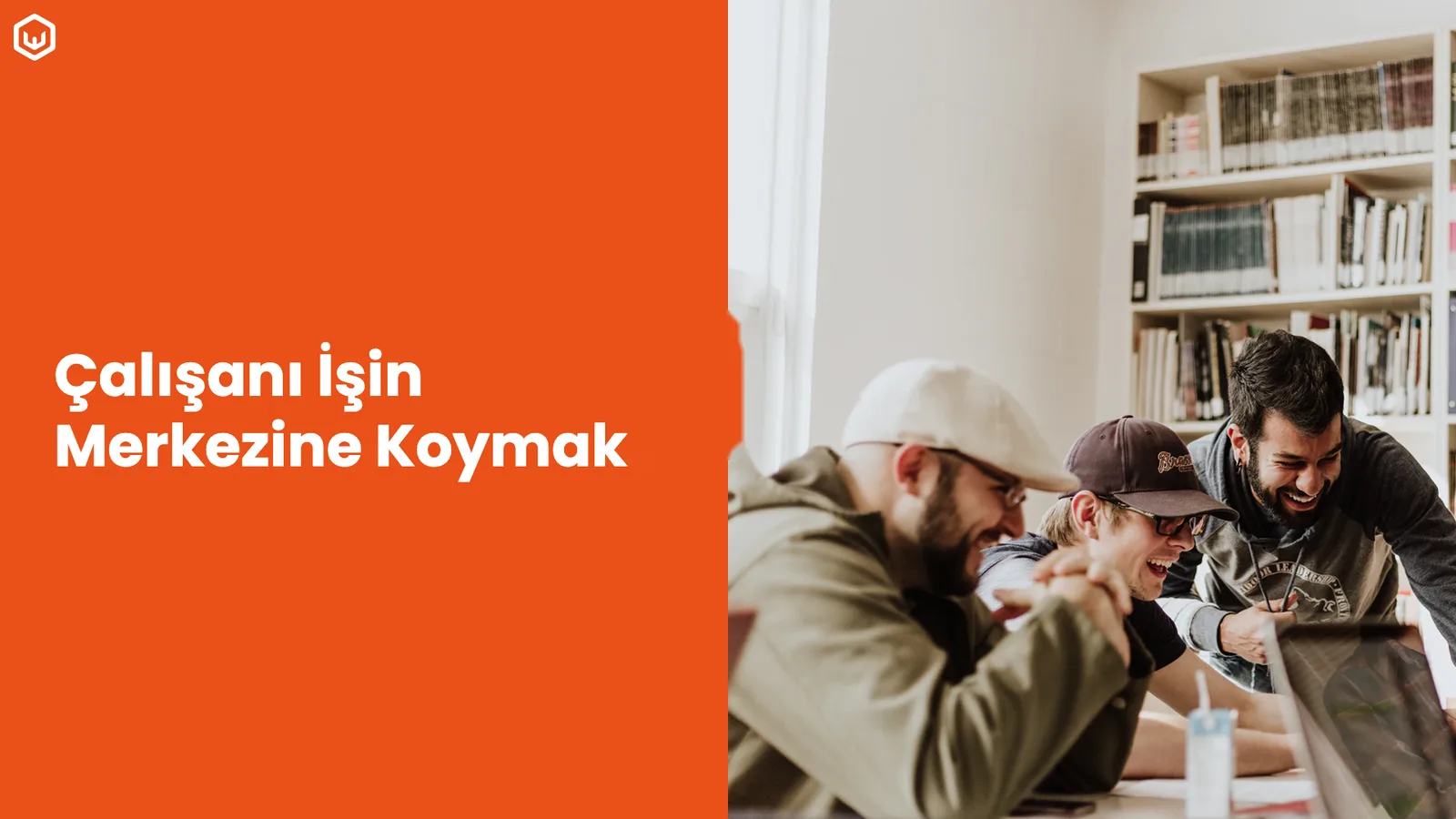 Gülen ekip fotoğrafı; başlık.